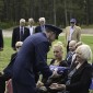 Colonel Presenting the flag